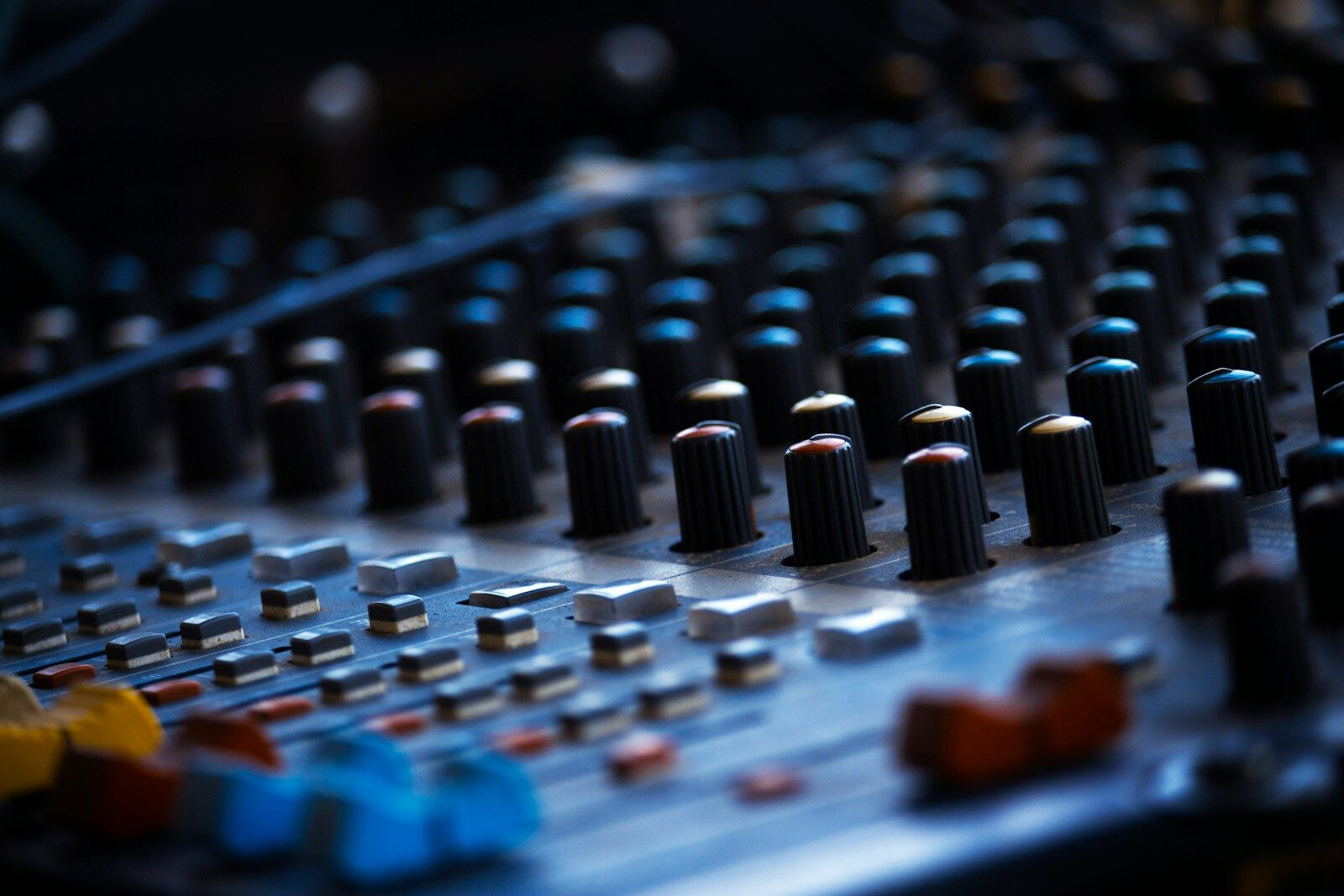 audio mixing console knobs and faders